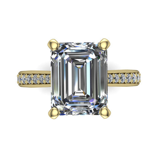 Ruby emerald classic engagement ring in 14K Yellow Gold, top-down view showing the prong-set center diamond over a diamond-set band