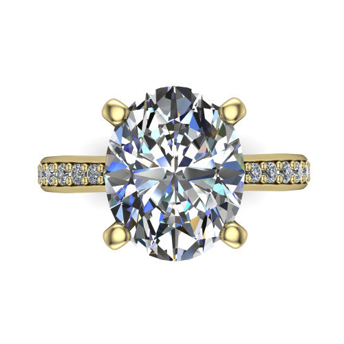 Ruby oval classic engagement ring in 18K Yellow Gold, top-down view showing the prong-set center diamond over a diamond-set band