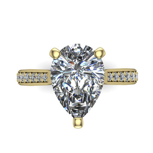 Ruby pear classic engagement ring in 14K Yellow Gold, top-down view showing the prong-set center diamond over a diamond-set band