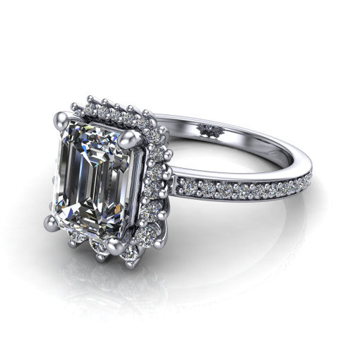 Persephone emerald halo engagement ring in 14K White Gold, three-quarter perspective showing the center framed by a vintage starburst cluster halo above a pav&eacute; shank