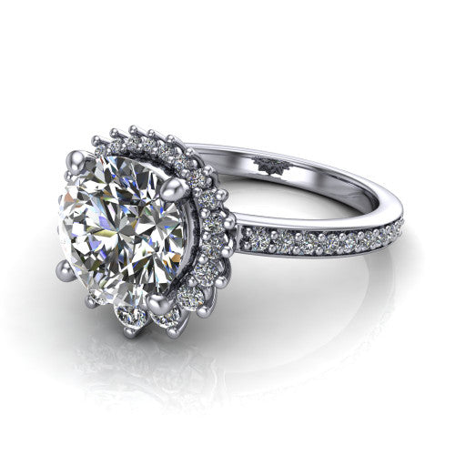 Persephone round halo engagement ring in Platinum, three-quarter perspective showing the center framed by a vintage starburst cluster halo above a pav&eacute; shank