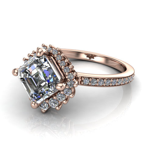 Persephone asscher halo engagement ring in 18K Rose Gold, three-quarter perspective showing the center framed by a vintage starburst cluster halo above a pav&eacute; shank