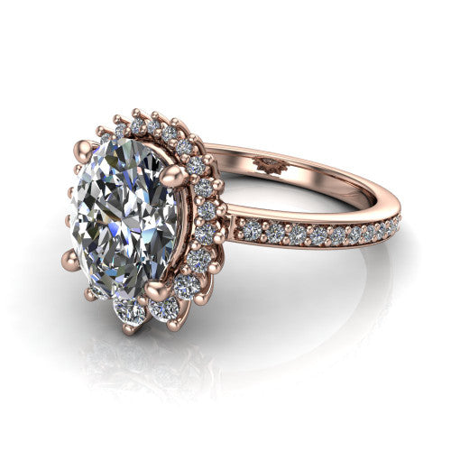 Persephone oval halo engagement ring in 14K Rose Gold, three-quarter perspective showing the center framed by a vintage starburst cluster halo above a pav&eacute; shank