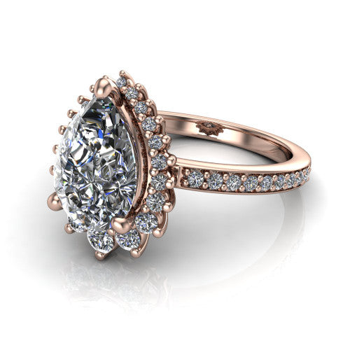 Persephone pear halo engagement ring in 14K Rose Gold, three-quarter perspective showing the center framed by a vintage starburst cluster halo above a pav&eacute; shank
