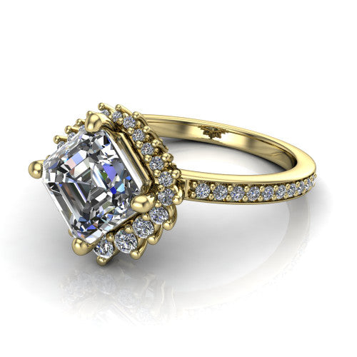 Persephone asscher halo engagement ring in 14K Yellow Gold, three-quarter perspective showing the center framed by a vintage starburst cluster halo above a pav&eacute; shank