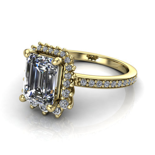 Persephone emerald halo engagement ring in 14K Yellow Gold, three-quarter perspective showing the center framed by a vintage starburst cluster halo above a pav&eacute; shank