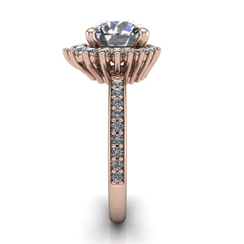 Persephone round halo engagement ring in 18K Rose Gold, side profile showing the pear and round accent cluster and the pav&eacute; diamonds down the shank