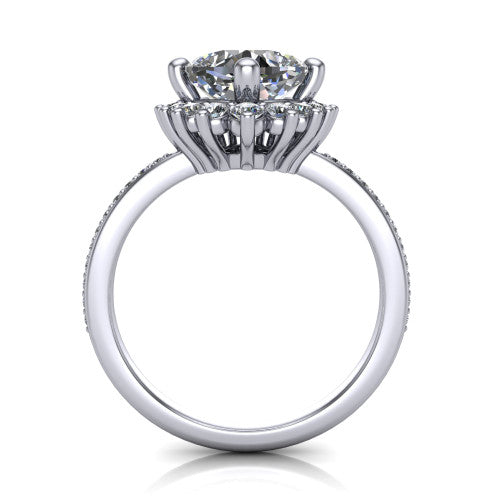 Persephone cushion halo engagement ring in Platinum, through-finger front profile showing the cluster halo head raised above the pav&eacute; band