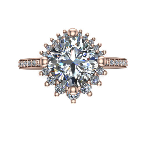 Persephone cushion halo engagement ring in 14K Rose Gold, top-down view showing the center diamond ringed by a snowflake halo of round and pear accent diamonds