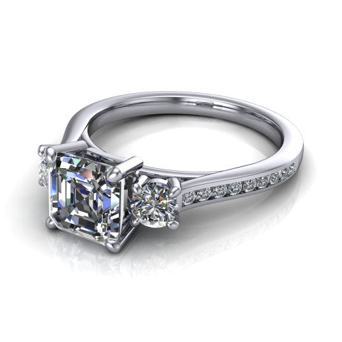 Saoirse asscher three stone engagement ring in 14K White Gold, three-quarter perspective showing the center diamond between two round side stones above a pav&eacute; shank