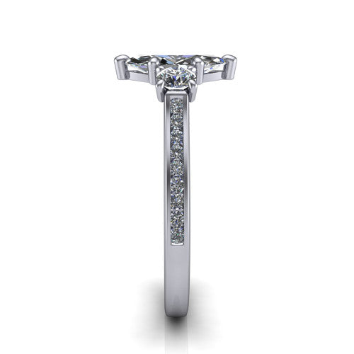 Saoirse marquise three stone engagement ring in 18K White Gold, side profile showing the round side stone and the pav&eacute; diamonds running down the shank