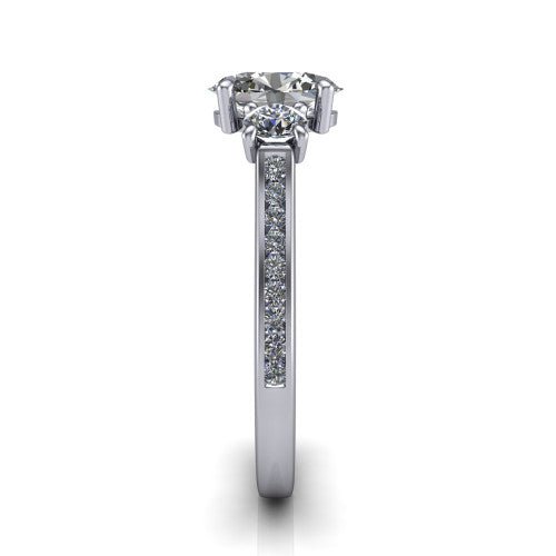 Saoirse oval three stone engagement ring in 18K White Gold, side profile showing the round side stone and the pav&eacute; diamonds running down the shank