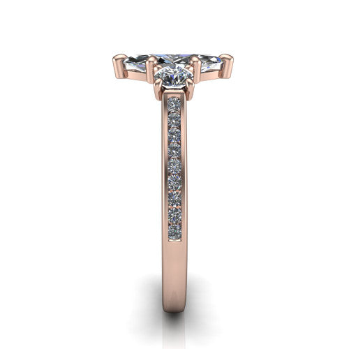 Saoirse marquise three stone engagement ring in 18K Rose Gold, side profile showing the round side stone and the pav&eacute; diamonds running down the shank