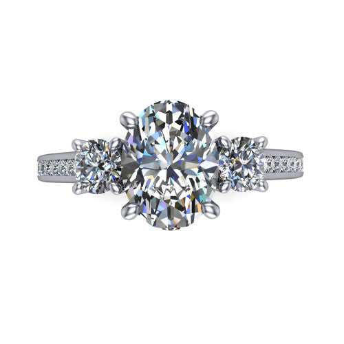 Saoirse oval three stone engagement ring in 18K White Gold, top-down view showing the center diamond flanked by two round side stones in a three stone setting