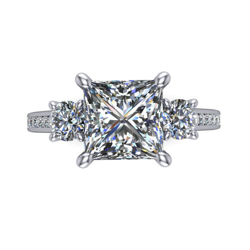 Saoirse princess three stone engagement ring in 18K White Gold, top-down view showing the center diamond flanked by two round side stones in a three stone setting