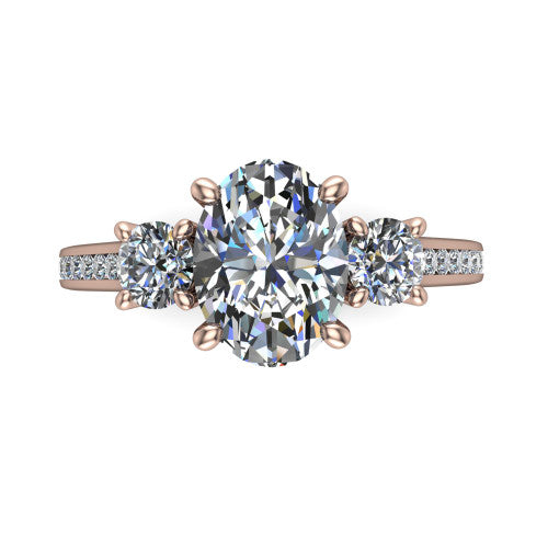 Saoirse oval three stone engagement ring in 18K Rose Gold, top-down view showing the center diamond flanked by two round side stones in a three stone setting