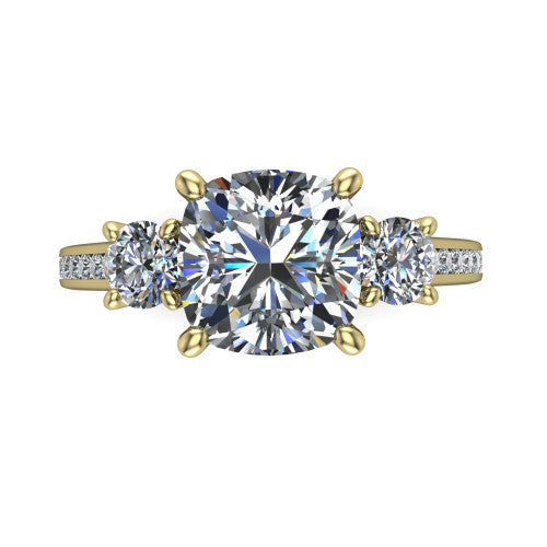Saoirse cushion three stone engagement ring in 14K Yellow Gold, top-down view showing the center diamond flanked by two round side stones in a three stone setting