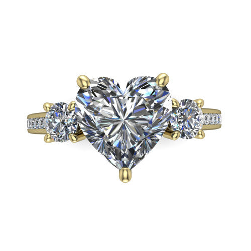 Saoirse heart three stone engagement ring in 14K Yellow Gold, top-down view showing the center diamond flanked by two round side stones in a three stone setting