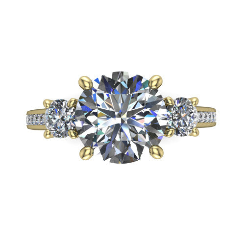 Saoirse round three stone engagement ring in 18K Yellow Gold, top-down view showing the center diamond flanked by two round side stones in a three stone setting