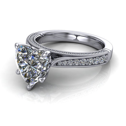 Maeve heart classic engagement ring in 14K White Gold, three-quarter perspective showing the solitaire center diamond raised above a milgrain-edged pav&eacute; shank