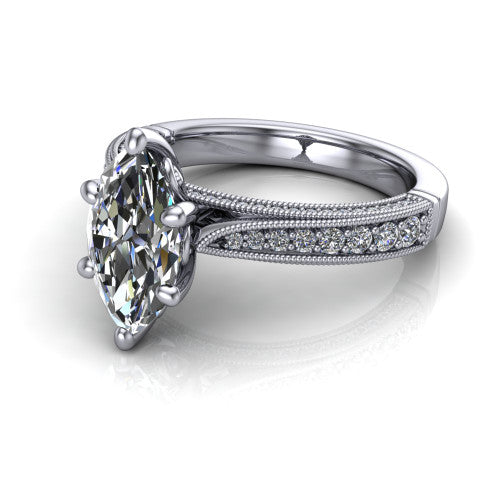 Maeve marquise classic engagement ring in Platinum, three-quarter perspective showing the solitaire center diamond raised above a milgrain-edged pav&eacute; shank