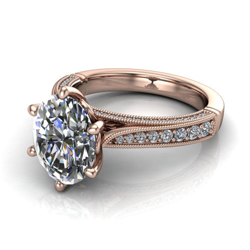 Maeve oval classic engagement ring in 18K Rose Gold, three-quarter perspective showing the solitaire center diamond raised above a milgrain-edged pav&eacute; shank