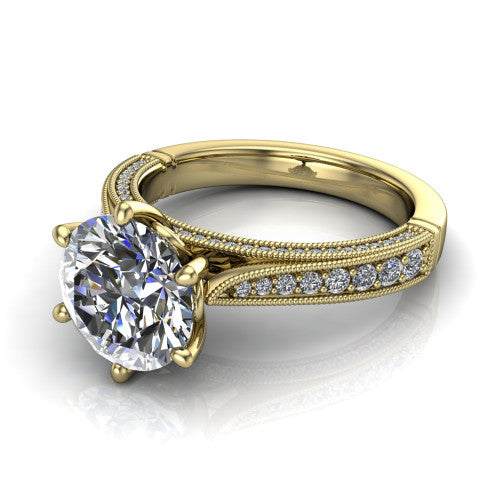 Maeve round classic engagement ring in 18K Yellow Gold, three-quarter perspective showing the solitaire center diamond raised above a milgrain-edged pav&eacute; shank
