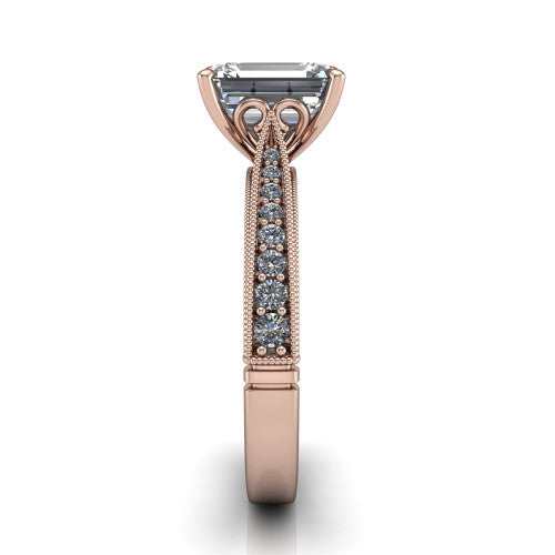 Maeve emerald classic engagement ring in 14K Rose Gold, side profile showing the milgrain edges and the round diamonds running down the shank