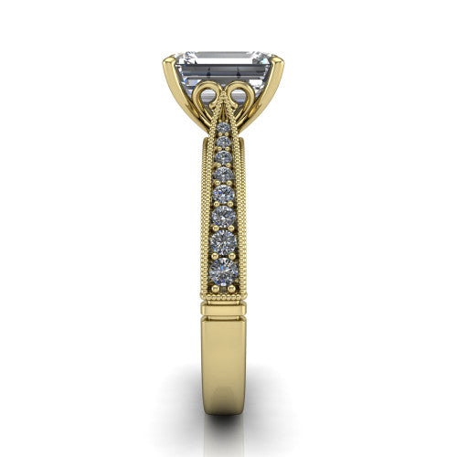 Maeve emerald classic engagement ring in 14K Yellow Gold, side profile showing the milgrain edges and the round diamonds running down the shank
