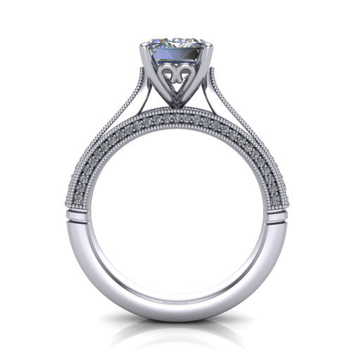 Maeve emerald classic engagement ring in Platinum, through-finger front profile showing the solitaire head raised above the milgrain pav&eacute; band