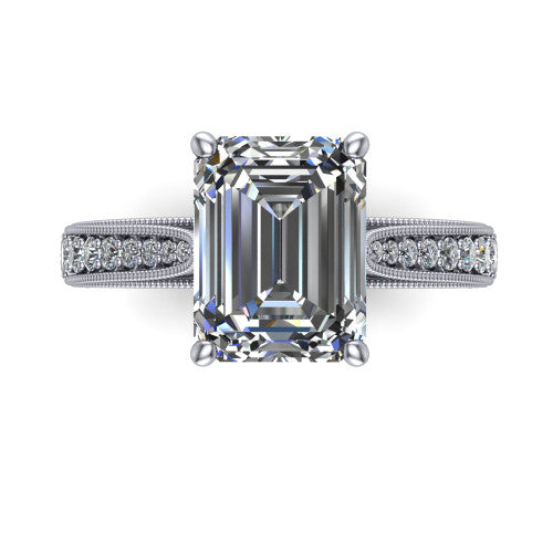 Maeve emerald classic engagement ring in Platinum, top-down view showing the prong-set center diamond over a diamond-set milgrain band