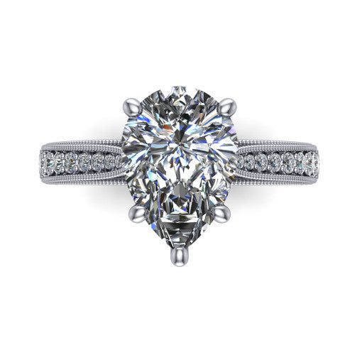 Maeve pear classic engagement ring in 14K White Gold, top-down view showing the prong-set center diamond over a diamond-set milgrain band