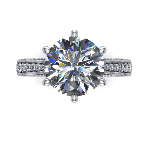 Maeve round classic engagement ring in 14K White Gold, top-down view showing the prong-set center diamond over a diamond-set milgrain band
