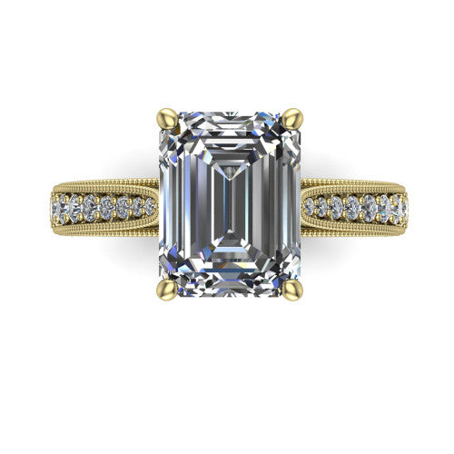 Maeve emerald classic engagement ring in 14K Yellow Gold, top-down view showing the prong-set center diamond over a diamond-set milgrain band