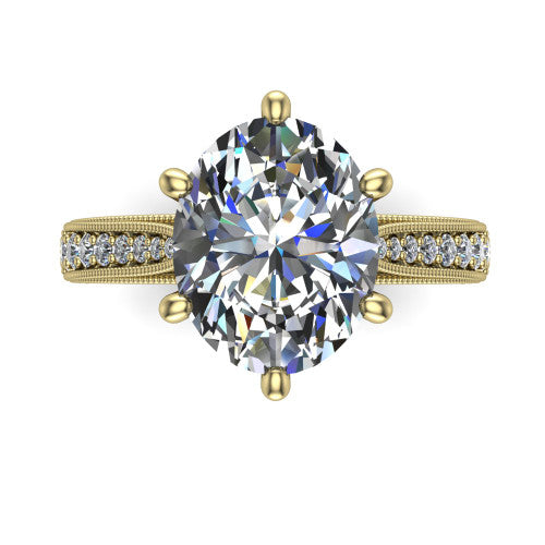 Maeve oval classic engagement ring in 18K Yellow Gold, top-down view showing the prong-set center diamond over a diamond-set milgrain band