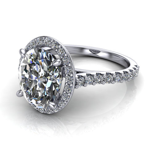 Rowan oval halo engagement ring in 14K White Gold, three-quarter perspective showing the haloed center raised above a pav&eacute; shank
