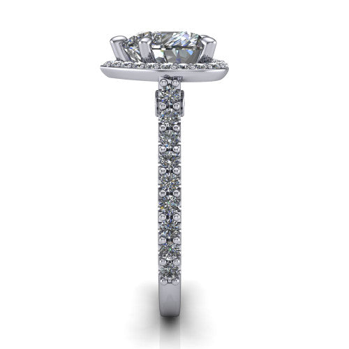 Rowan heart halo engagement ring in Platinum, side profile showing the pav&eacute; diamonds running down the shank and the hidden gallery accent