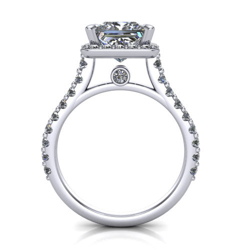 Rowan princess halo engagement ring in 14K White Gold, through-finger front profile showing the halo head raised above the pav&eacute; band and a peek-a-boo gallery diamond