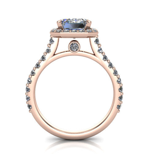 Rowan emerald halo engagement ring in 18K Rose Gold, through-finger front profile showing the halo head raised above the pav&eacute; band and a peek-a-boo gallery diamond