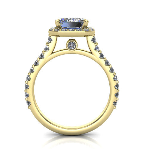 Rowan emerald halo engagement ring in 14K Yellow Gold, through-finger front profile showing the halo head raised above the pav&eacute; band and a peek-a-boo gallery diamond