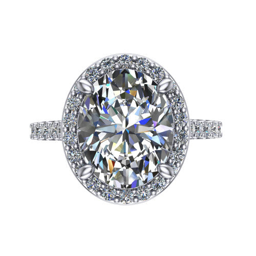 Rowan oval halo engagement ring in 14K White Gold, top-down view showing the center diamond framed by a pav&eacute; halo with decorative corner prongs