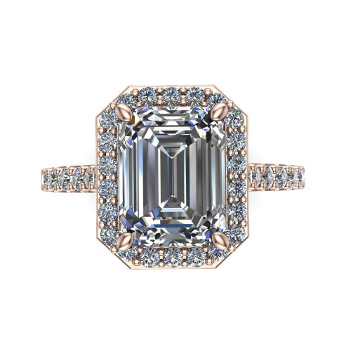 Rowan emerald halo engagement ring in 18K Rose Gold, top-down view showing the center diamond framed by a pav&eacute; halo with decorative corner prongs