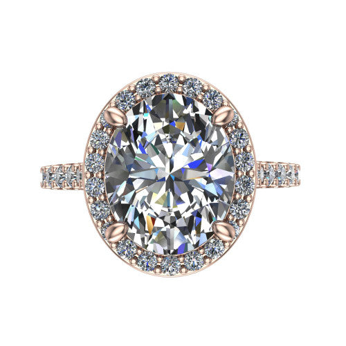 Rowan oval halo engagement ring in 14K Rose Gold, top-down view showing the center diamond framed by a pav&eacute; halo with decorative corner prongs