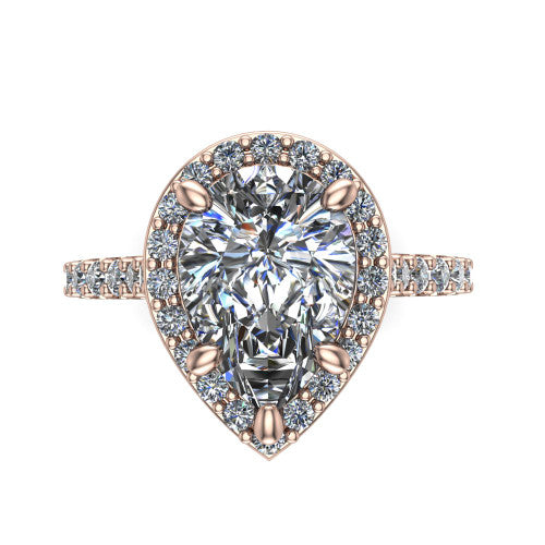 Rowan pear halo engagement ring in 14K Rose Gold, top-down view showing the center diamond framed by a pav&eacute; halo with decorative corner prongs