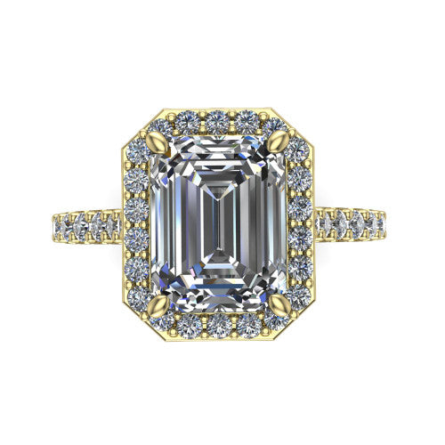 Rowan emerald halo engagement ring in 14K Yellow Gold, top-down view showing the center diamond framed by a pav&eacute; halo with decorative corner prongs