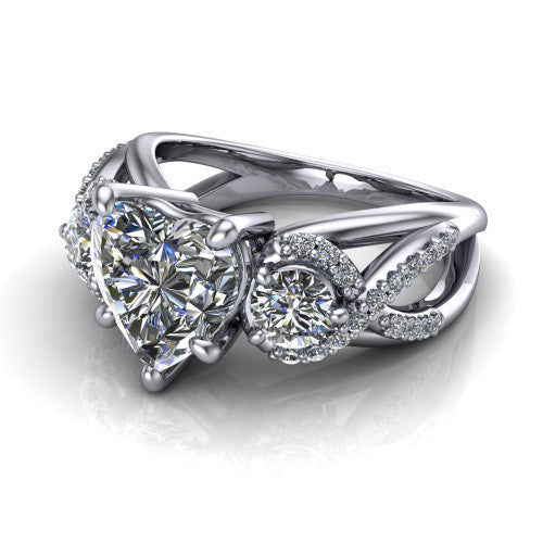 Amara heart three stone engagement ring in 14K White Gold, three-quarter perspective showing the center diamond between two round side stones above an infinity-twist pav&eacute; shank