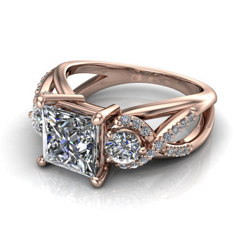Amara princess three stone engagement ring in 18K Rose Gold, three-quarter perspective showing the center diamond between two round side stones above an infinity-twist pav&eacute; shank