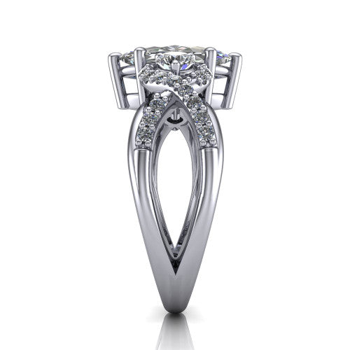 Amara marquise three stone engagement ring in Platinum, side profile showing the pav&eacute; rails crossing in an infinity twist beneath the head
