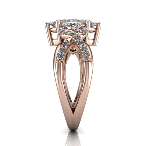 Amara marquise three stone engagement ring in 18K Rose Gold, side profile showing the pav&eacute; rails crossing in an infinity twist beneath the head