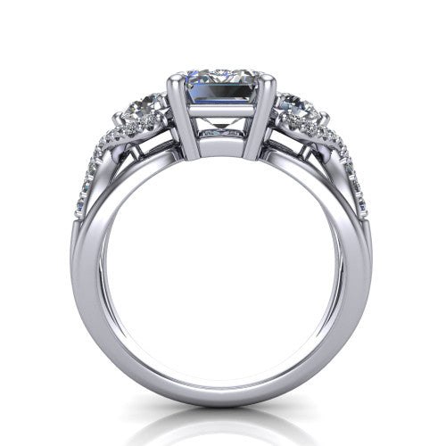 Amara emerald three stone engagement ring in Platinum, through-finger front profile showing the three-stone head raised above the woven split band
